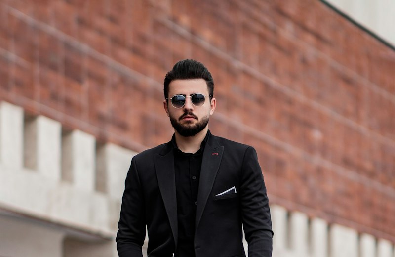 Man in a tailored black suit